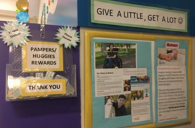 Under 2 bulletin board featuring community assistance projects