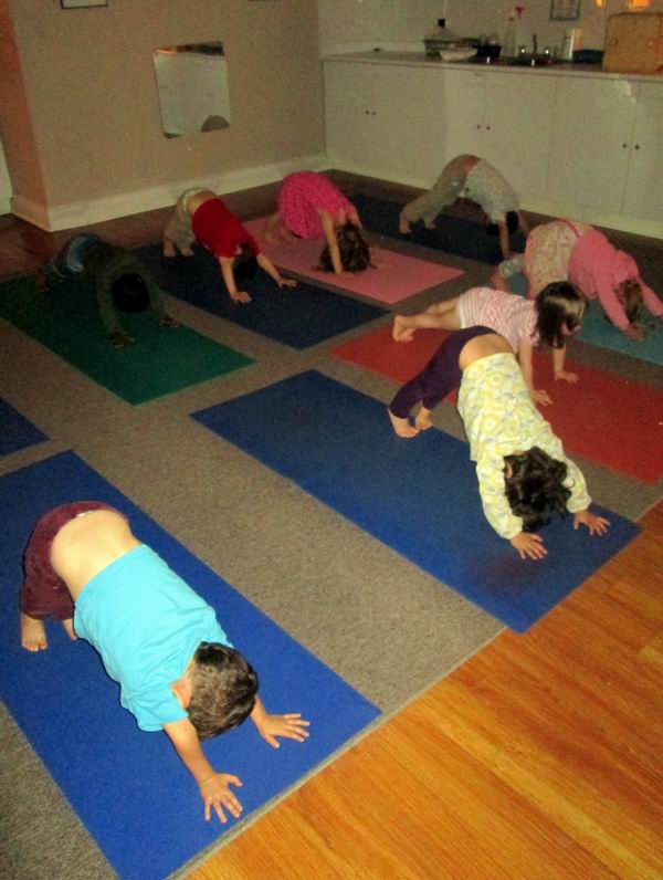 Children practicing yoga