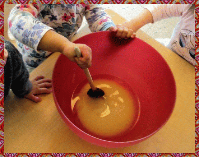 Child stirring cookie mixture