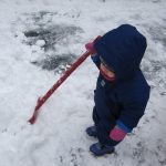 Child under 2 shovelling snow