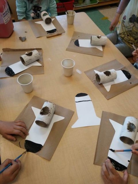 Children creating space shuttles