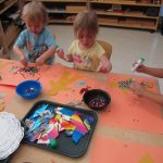 Casa children making art