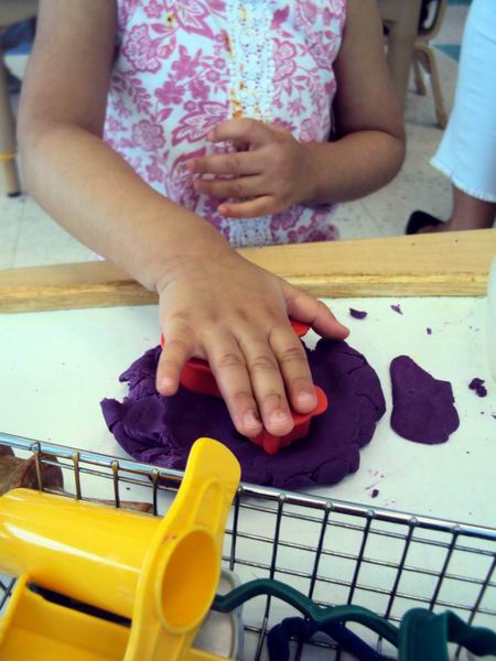 Child working with playdough