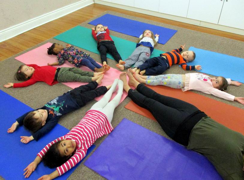 Children practicing yoga