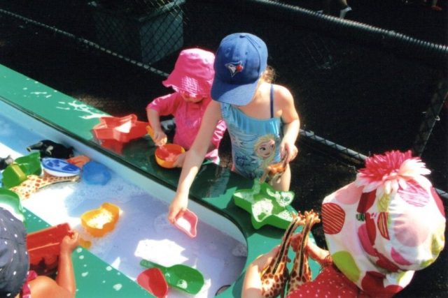 Children playing at the water table