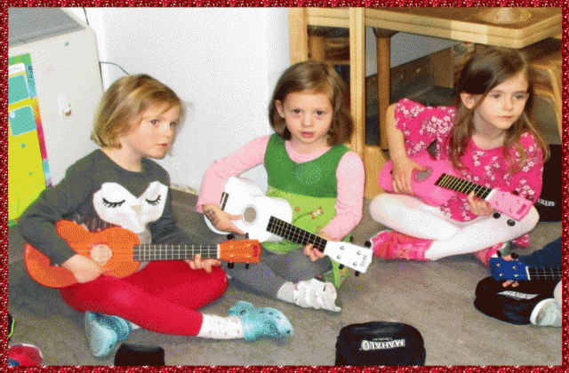 Children playing the ukulele