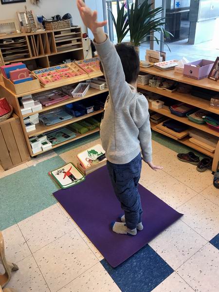 Child practicing yoga