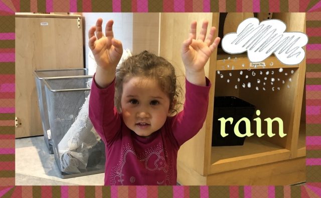 Child under 2 signing 'rain'