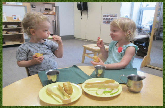 Two children having snack