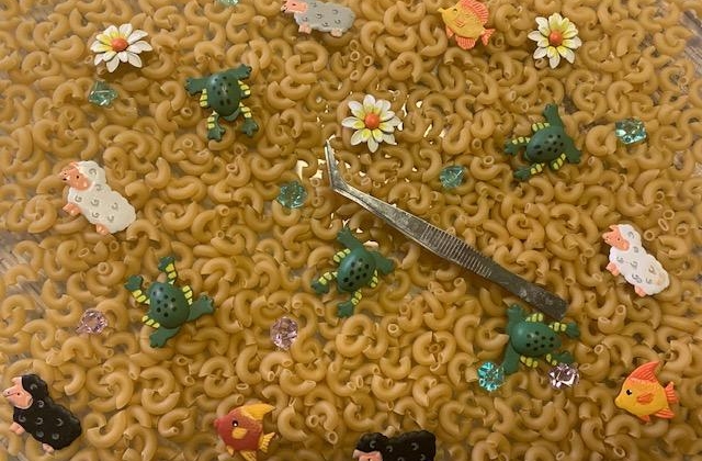 Dry pasta and tools for sensory play