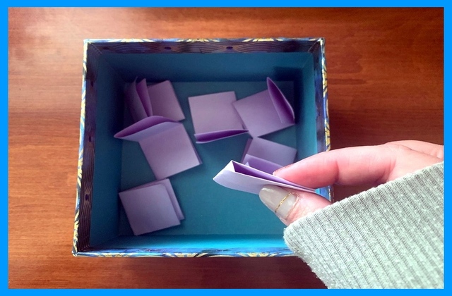 Choosing a folded paper in Whisper Box