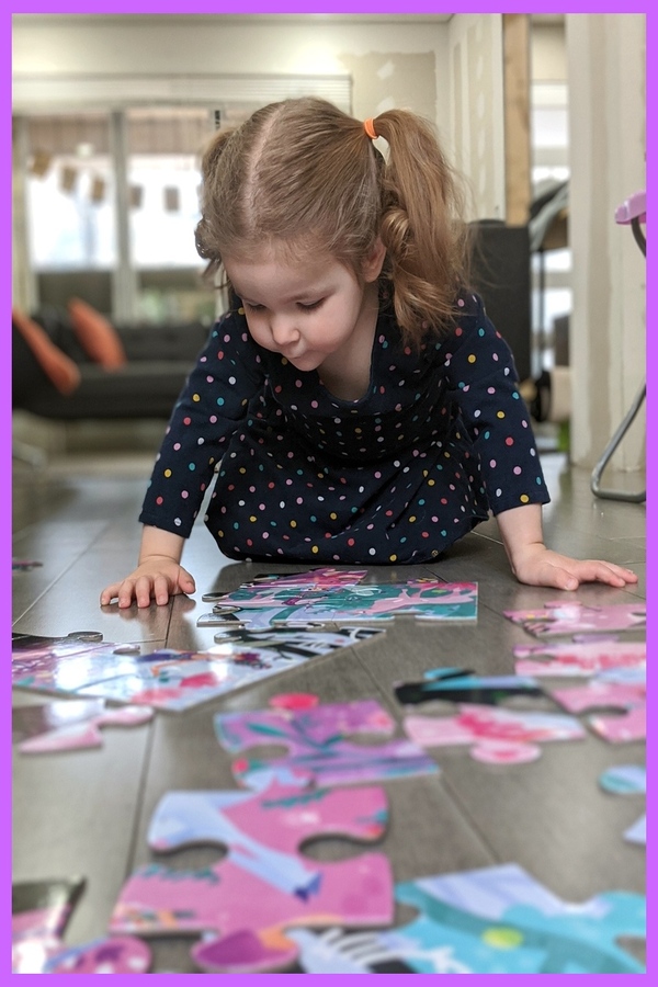 Fiona doing a floor puzzle