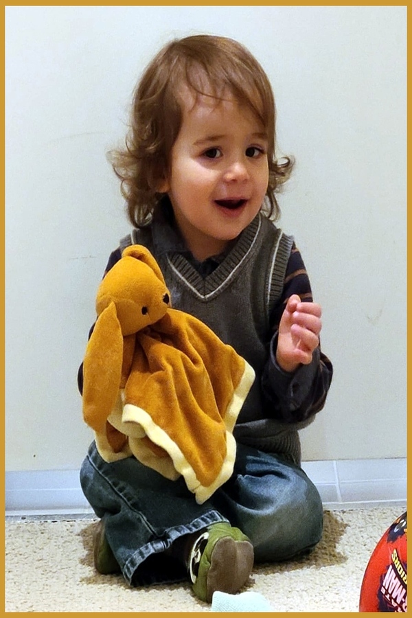 Samuele holding a puppet