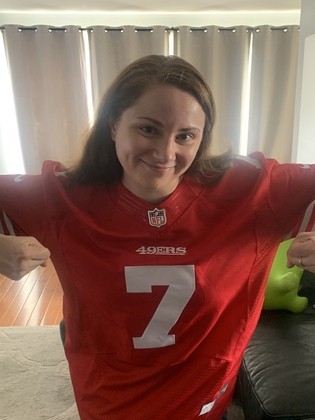 Laura wearing a sports jersey