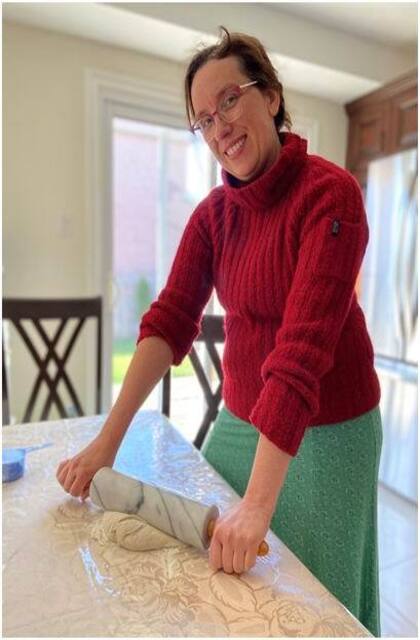 Rolling out pizza dough