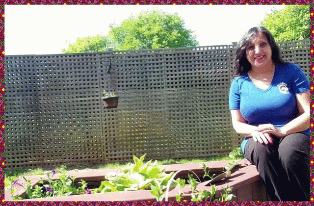 Ayisha by her planter box