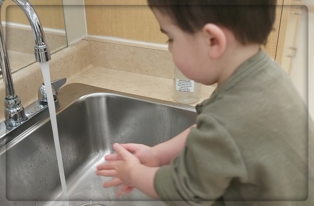 Child under 3 hand washing