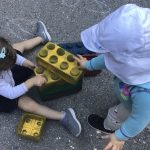 Children under 2 playing with big blocks