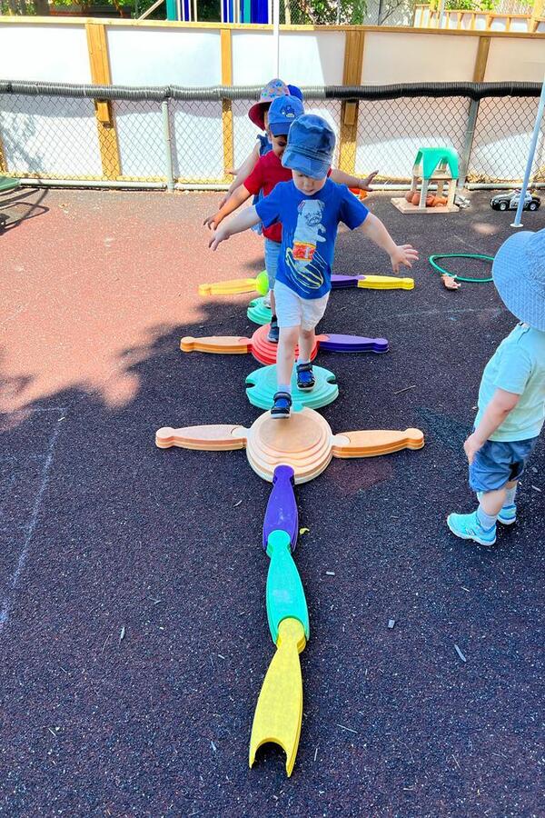 Children walking on a balance path