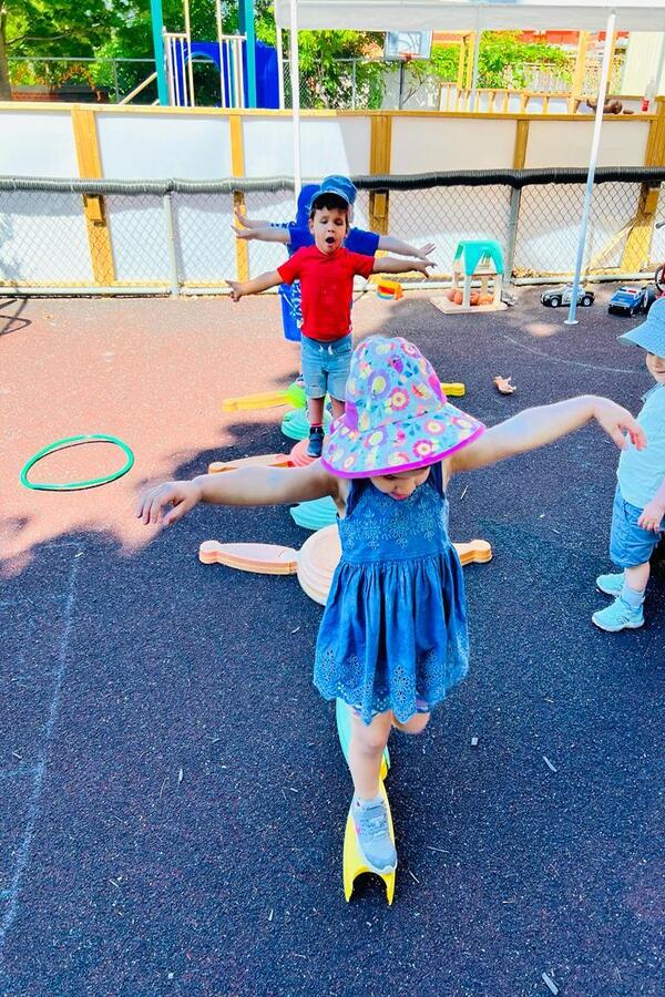 Children walking on a balance path