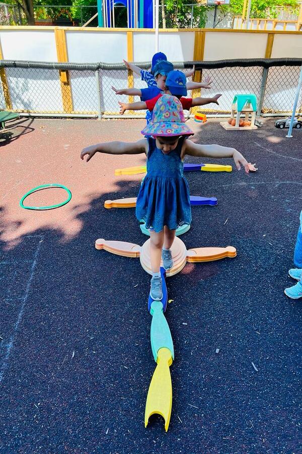 Children walking on a balance path