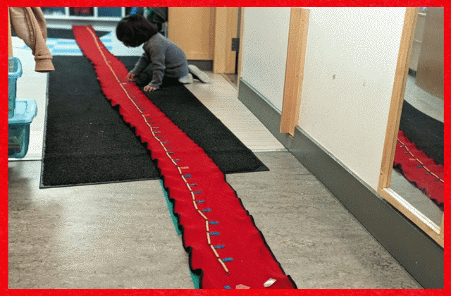 A child working on skip counting with bead chains