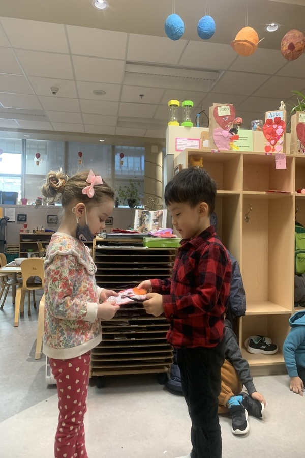 Children giving and receiving a valentine