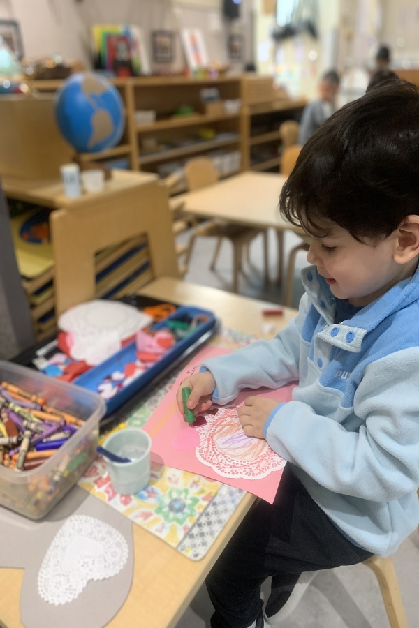 A child making a valentine