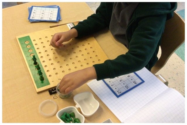 A child working on division