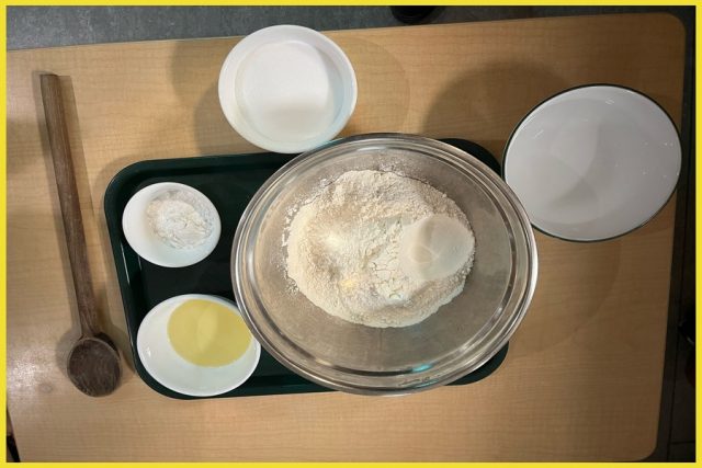 Playdough ingredients measured out in bowls